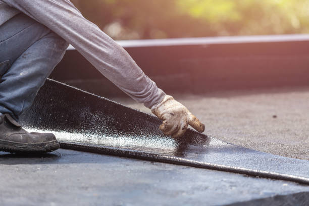 Professional Emergency Waterproofing technician working in Young America, MN